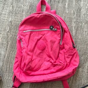 Kipling. Backpack in Barbie pink.